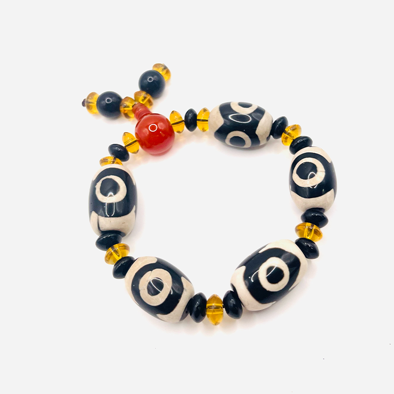 Armband aus Dzi-Stein mit drei Augen - Schwarz und Weiß - Tibetwelt