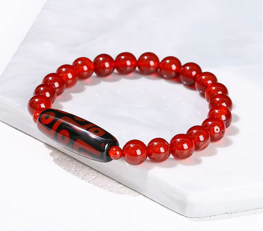 Dzi-Armband mit 9 Augen, Heilung - Roter Stein - Tibetwelt