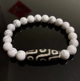 Armband Dzi mit 9 Augen, Howlit - Tibetwelt