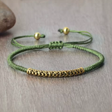 Schwarzes handgeflochtenes tibetisch-buddhistisches Armband