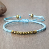 Schwarzes handgeflochtenes tibetisch-buddhistisches Armband