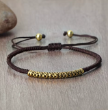 Schwarzes handgeflochtenes tibetisch-buddhistisches Armband