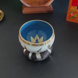 Tibetische goldene Buddha-Klangschale